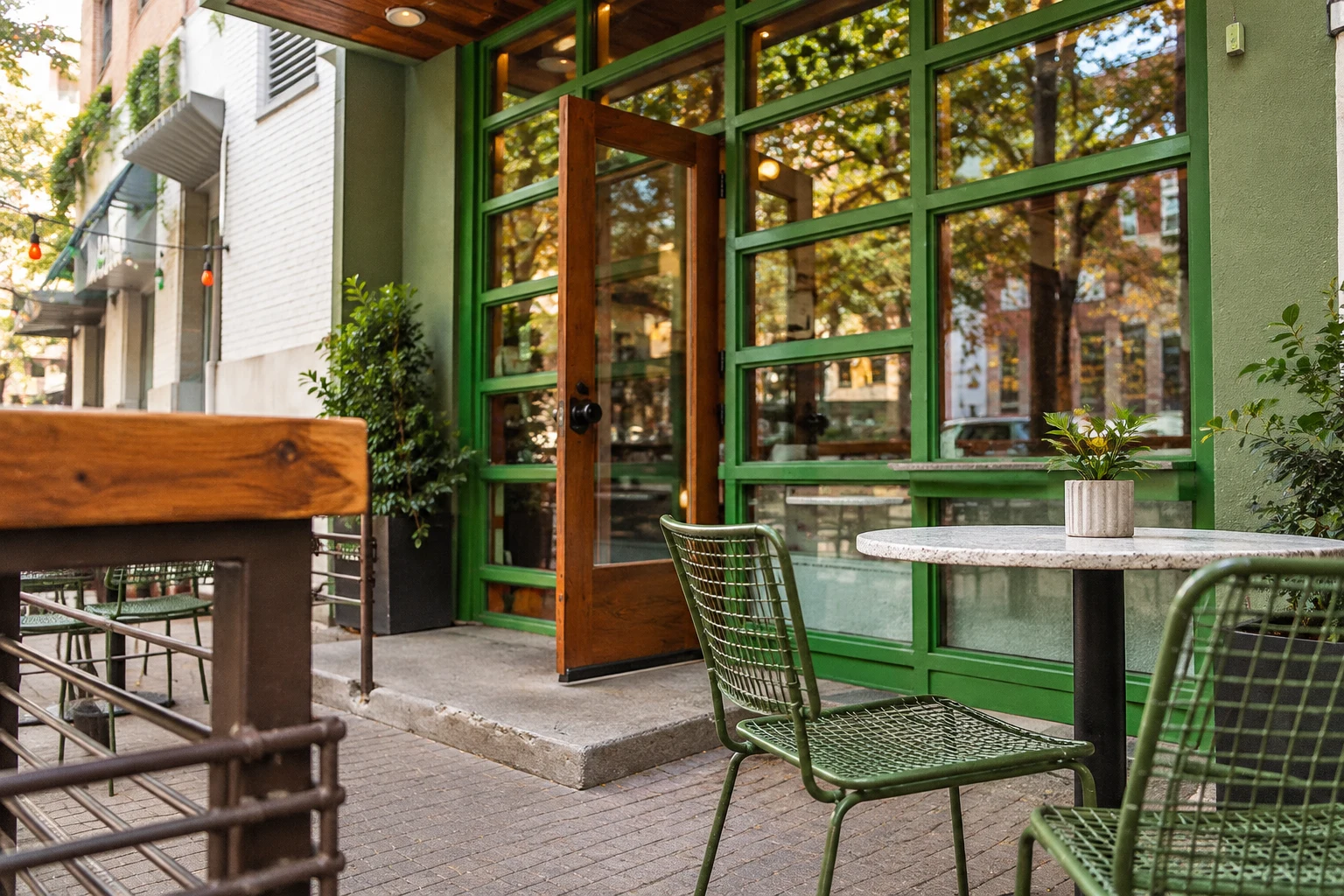 Sidewalk seating beside Jo’s Downtown entrance