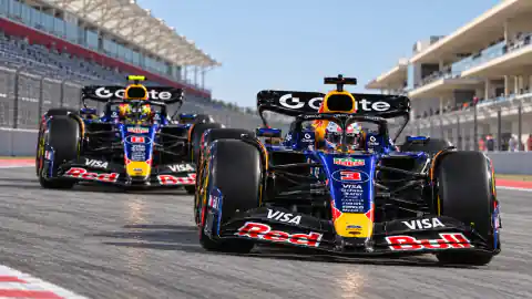 Max Verstappen in the number 3 car leading Isack Hadjar on the COTA main straight