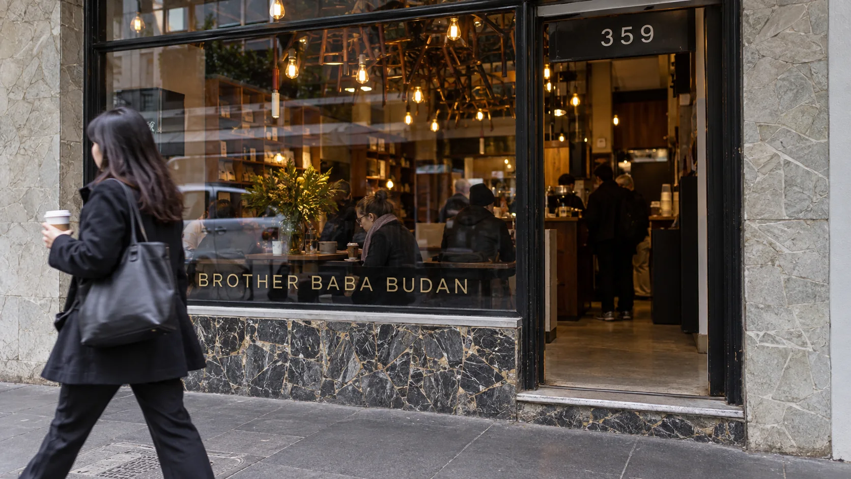 Brother Baba Budan’s glass frontage at 359 Little Bourke Street