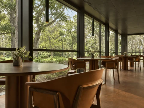 Garden-facing tables at Yiaga