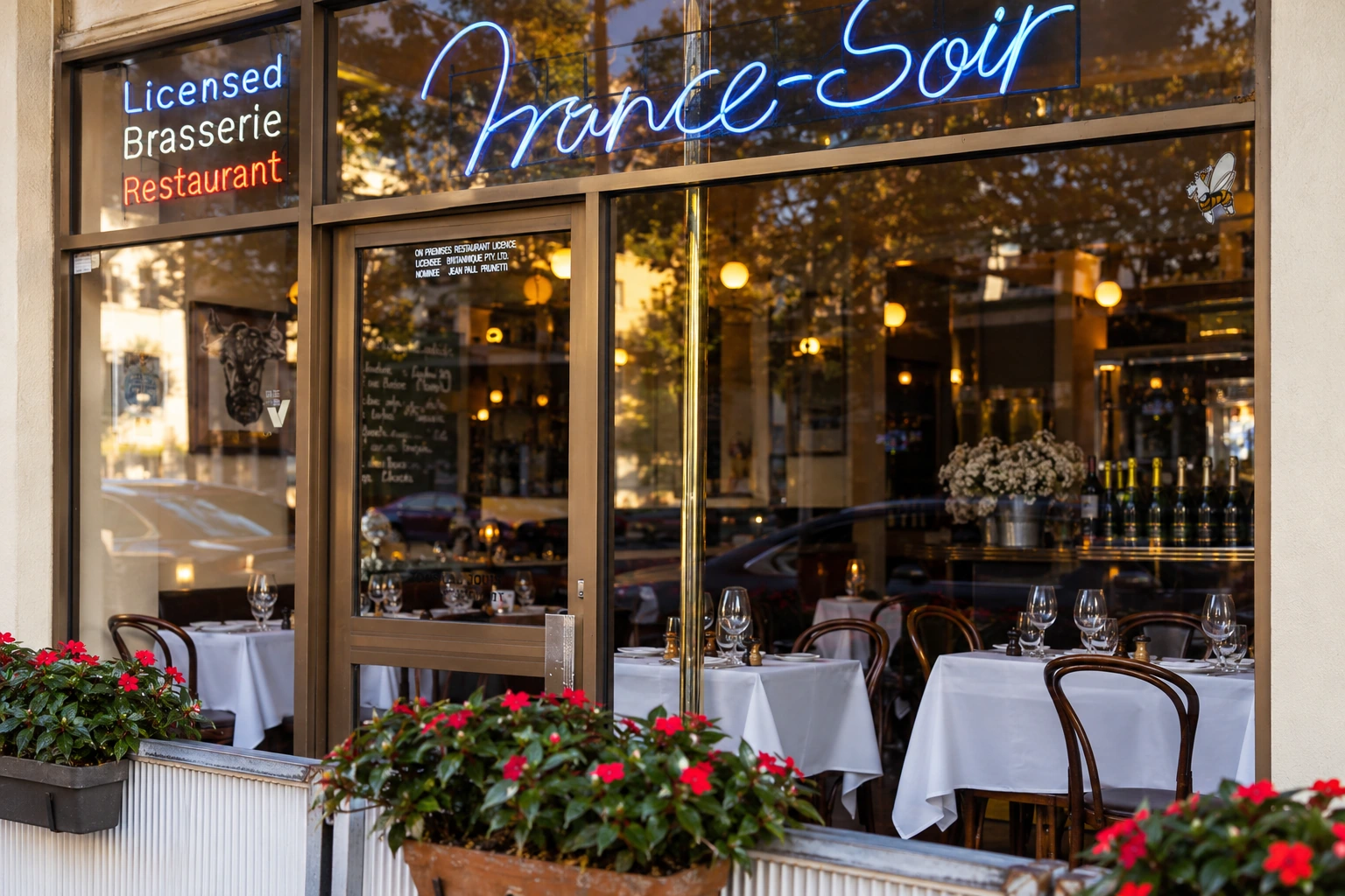 France-Soir’s entrance and neon window signs