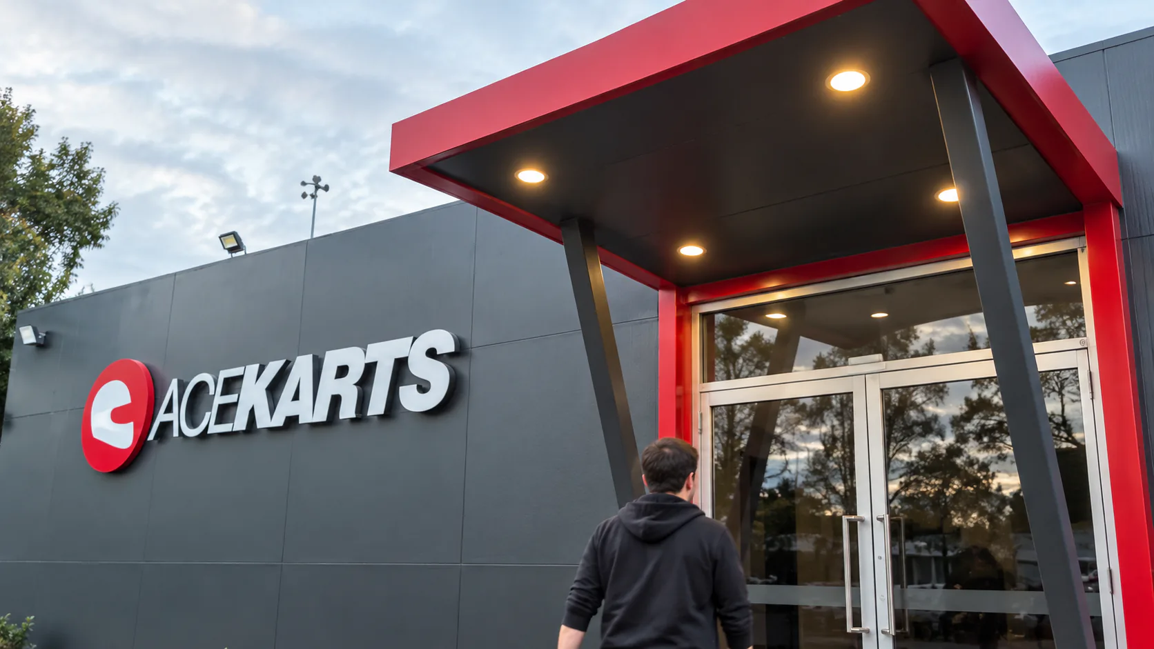 Ace Karts' signed entrance and red canopy in Albion.