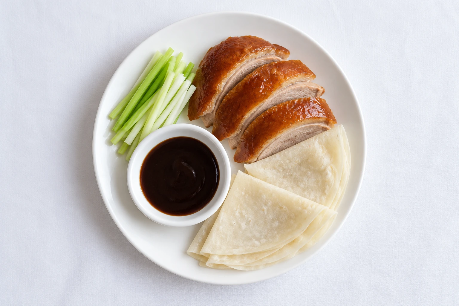 Roast duck, pancakes and sauce at Flower Drum