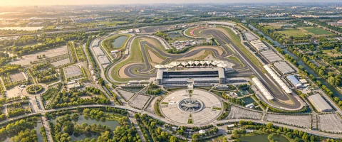 Destination artwork of Shanghai: Shanghai International Circuit and its distinctive sweeping grandstand canopies, track and spring green landscape.