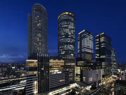 Editorial illustration of Nagoya Marriott Associa Hotel: jr central towers dusk.