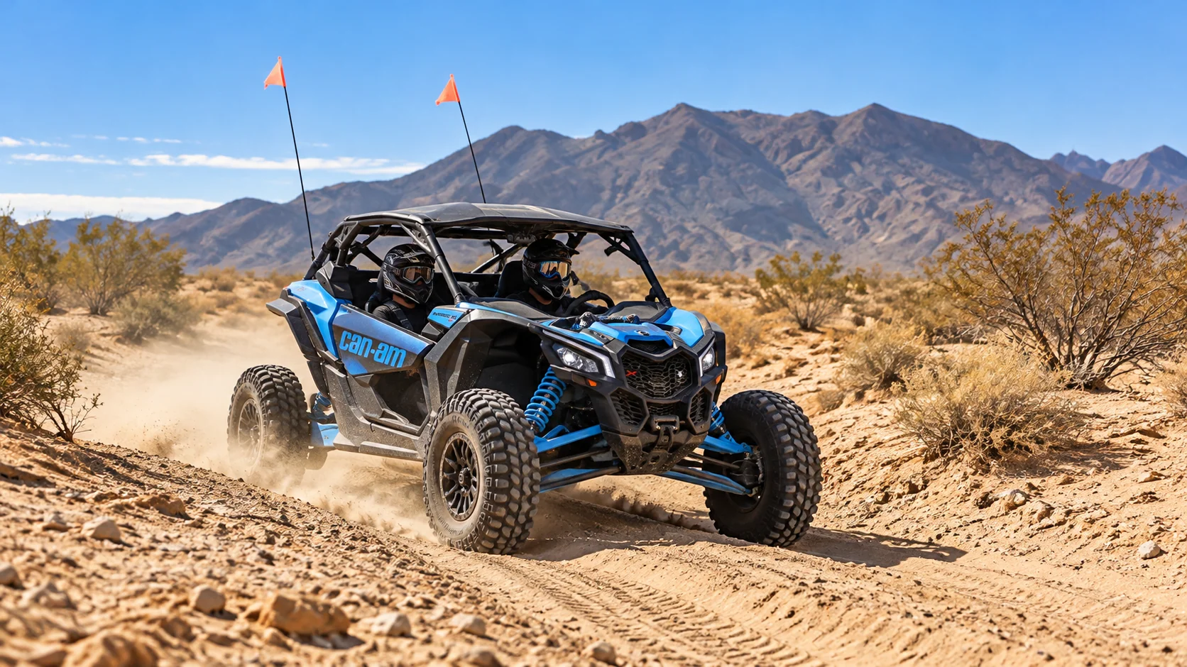 A Can-Am Maverick X3 crossing a sandy Nevada wash