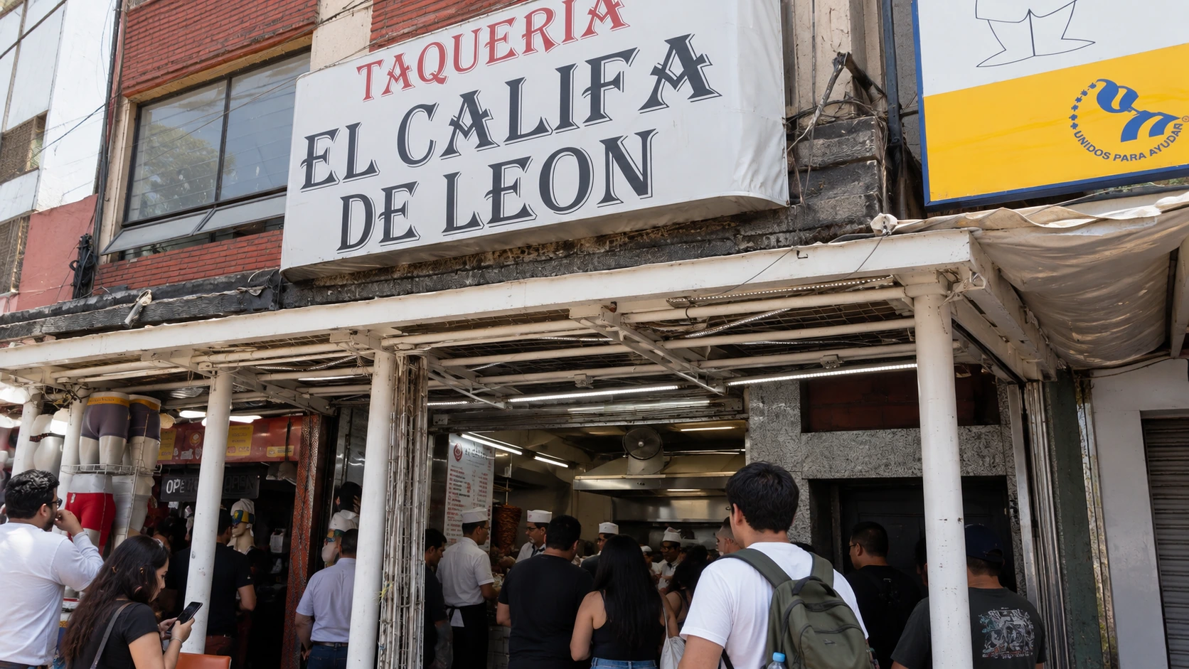 El Califa de León’s sign above the open street entrance in San Rafael