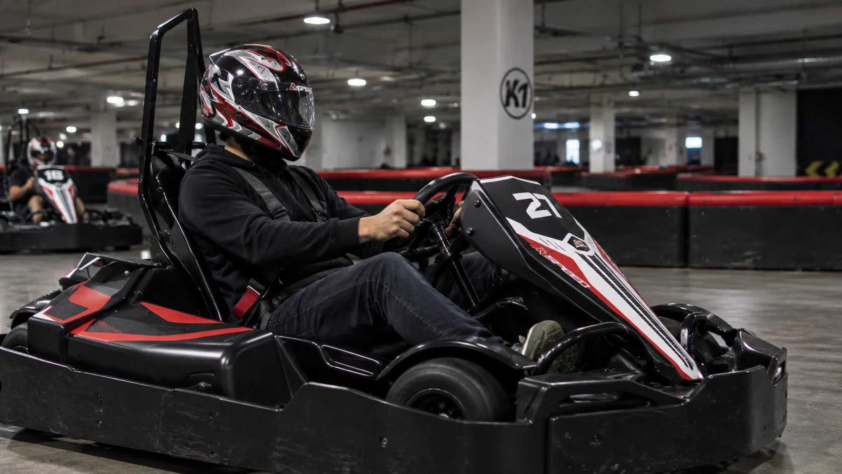 Driver seated in an electric kart at K1 Speed Coapa