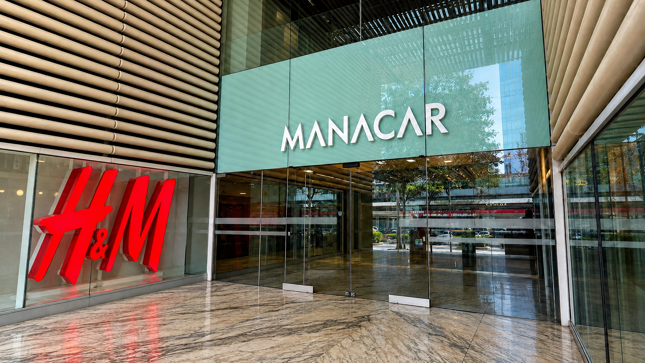 Sheltered Manacar shopping-centre entrance; K1 Speed is on basement level -7