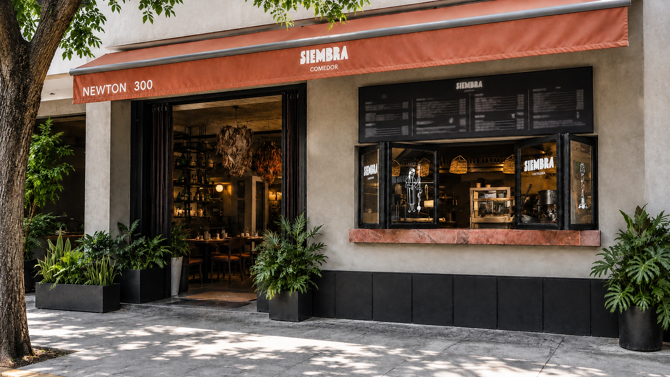Siembra Comedor’s entrance and street-facing service window on Newton