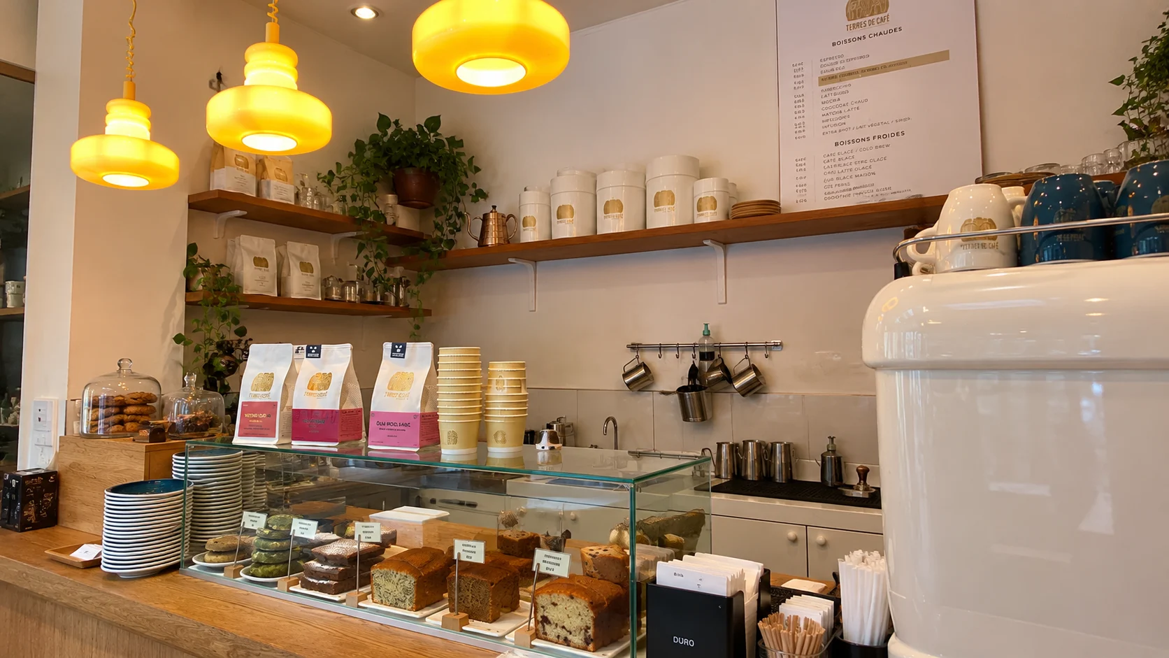Coffee display and yellow pendant lamps