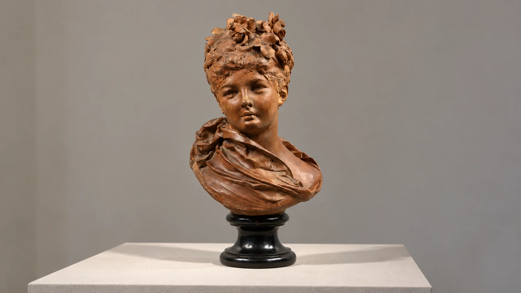 Young woman with roses in her hair