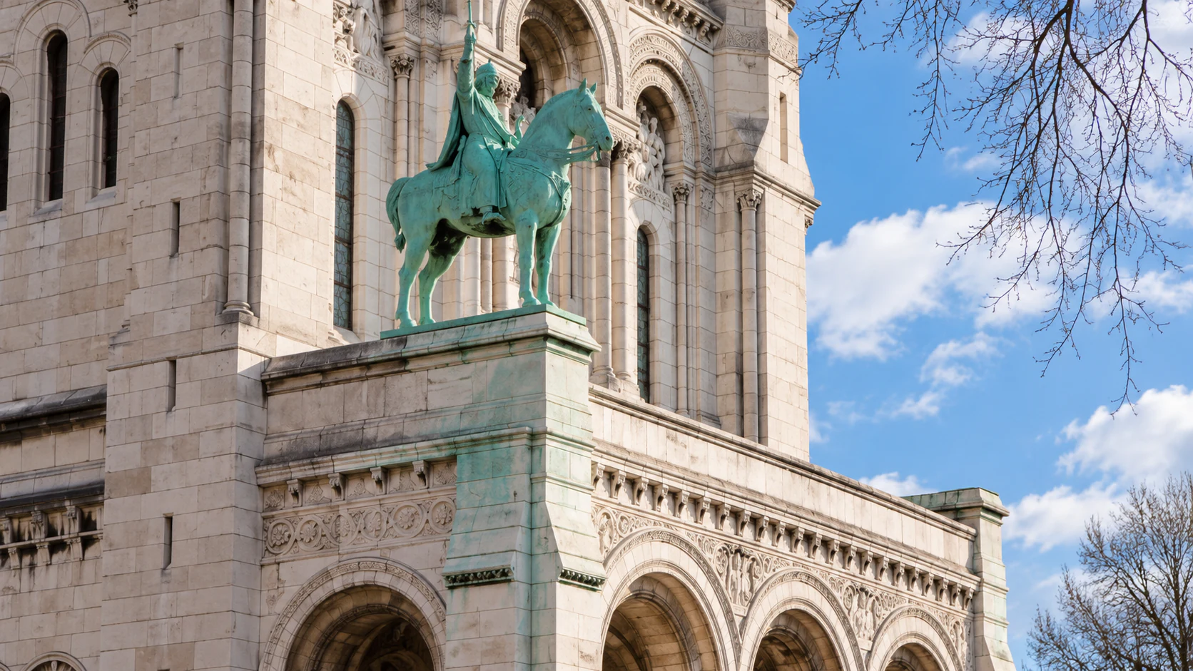 Equestrian statue above the portico
