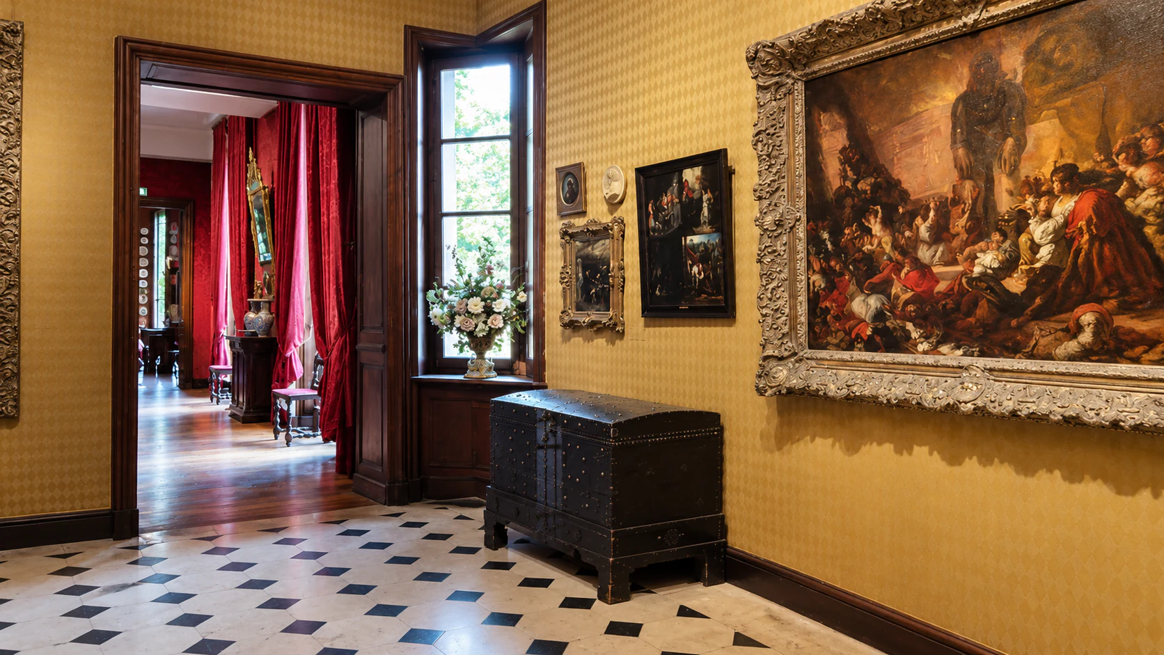 Family portraits and tiled floor in the antichambre at Maison de Victor Hugo